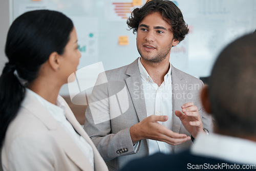 Image of Meeting, team and business people planning a project in a group discussion in the office conference room. Teamwork, collaboration and staff in discussion on marketing plan or strategy in a boardroom.