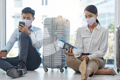 Image of Covid, delay and business people waiting in airport for a cancelled flight, schedule or coronavirus news. Crisis, compliance and corporate woman in mask stressed and frustrated with traveling visa