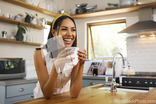 Image of Happy woman, coffee or tea in home kitchen and relax with a smile in the morning at house. Calm young person, smiling at peace and tea drink to wake up to start day with positive joyful thoughts