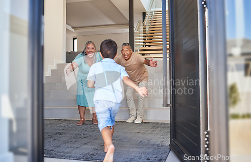 Image of Excited kid running to grandparents in family home meeting, greeting and hugging with love, care and happiness. Elderly man, senior woman and happy people welcome grandson child at front door house