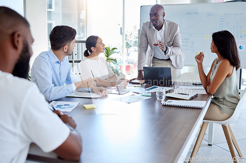 Image of Black man, speaker and laptop presentation in business meeting, strategy planning and digital marketing global office boardroom. Talking manager, mentor and leadership technology in teamwork training