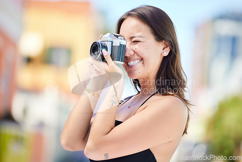 Image of Travel, photography and woman with camera in miami taking pictures of the city, buildings or town on vacation. Photographer, girl on holiday or vacation taking photo for happy memory or moments