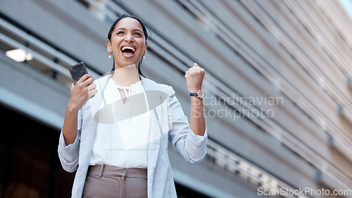 Image of Phone, success celebration and woman in city after winning, deal or receiving startup funding. Wow, winner and Indian female excited, victory or celebrating financial goals, mission or sales targets.