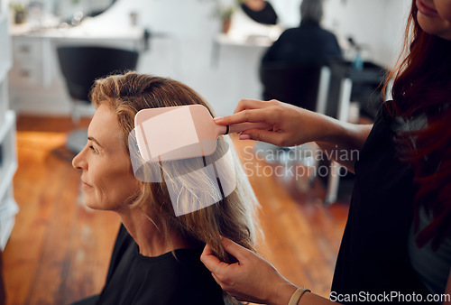 Image of Beauty salon, hair care and brush for woman customer, cosmetic change and fashion after wash, haircut and dry in barbershop. Professional beautician stylist consulting client hairstyle in hairdresser