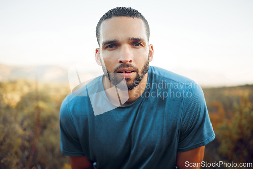 Image of Fitness, running and man portrait with sweat face in forest for cardio exercise in Phoenix, USA. Runner workout with wet and tired guy taking a breath to rest and cool down in green woods.