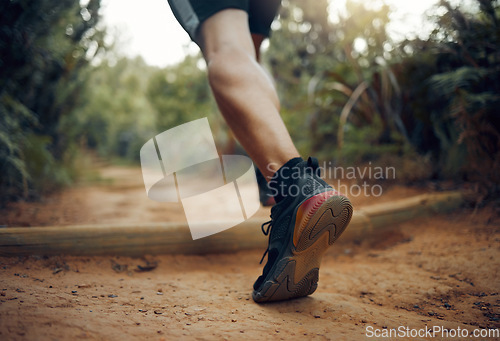 Image of Hiking shoes, nature park trail running and fitness runner on a dirt walking road outdoor. Training, exercise and sport man on cardio, healthy and strong workout of an athlete doing morning sports