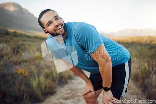 Image of A tired runner, man on nature run for fitness exercise and marathon training cardio health workout. Sports athlete working out, train for sport competition and rest after running on natural dirt road