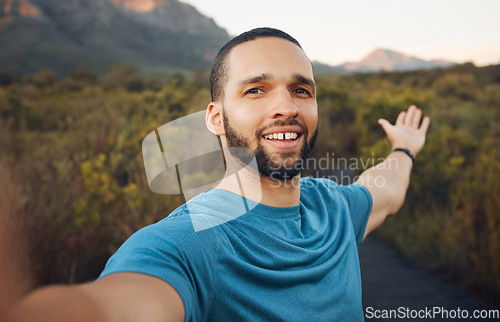 Image of Fitness, running and man taking a selfie on mountain during outdoor run. Young runner on hike, workout and exercise in nature takes picture of scenic view. Hiking, travel and adventure in Australia