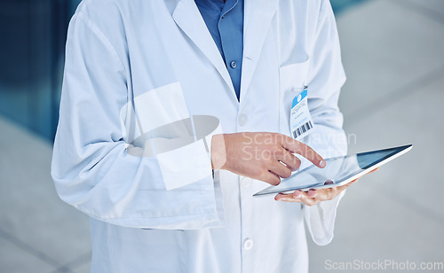 Image of Doctor, digital tablet and healthcare with man using 5g network for research, information technology or online consultation for health insurance FAQ. Hands of male GP using app for medical records