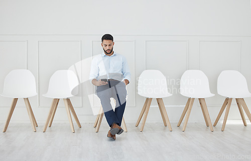 Image of Hiring, smartphone and businessman in recruitment waiting room for social media marketing and advertising interview with HR. Human resources, job career and 5g social network expert review digital cv