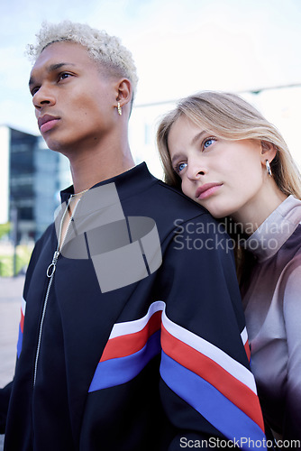 Image of Couple love, serious and street fashion modern gen z or edgy millennial style in city together. Young man and woman, diverse fashionable friends and cool trendy youth outdoor designer wear lifestyle