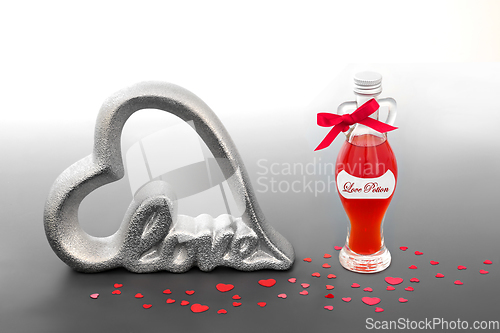 Image of Valentines Day Love Potion and Heart Shaped Sign 