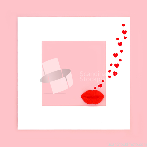 Image of Luscious Red Lips Blowing Kisses for Valentines Day