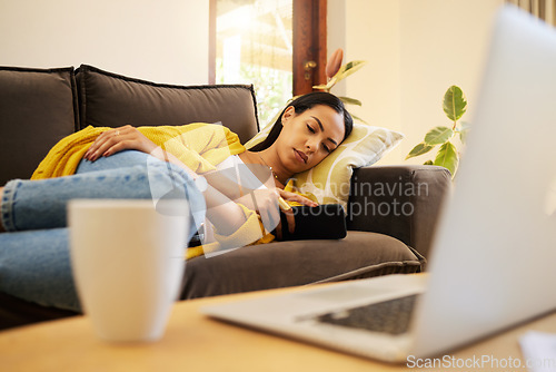 Image of Tired woman, phone and relax for work break at home lying on living room sofa with technology. Female freelancer overworked, burnout and relaxing on a couch texting or streaming on mobile smartphone