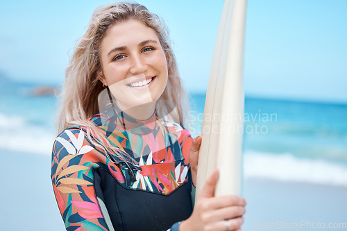 Image of Happy, surfer and woman sport athlete at the beach water waves with a surfboard. Portrait of a sports person from California smile ready for sea surfing fitness, workout and exercise by the ocean