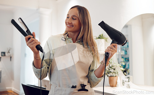 Image of Woman, hairdresser and smile with hair tools for success in remote small business in salon. Happy female freelancer or professional hairstylist in shop smiling for career, dream and ambition at work