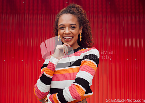 Image of Fashion, happy and black woman against a red wall in the city of Japan for travel holiday. Portrait of a young, urban and African girl with cool clothes on a vacation for freedom and happiness