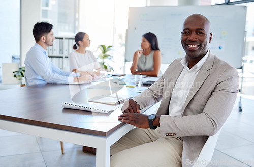 Image of Black man, business meeting and portrait in office, startup and teamwork planning in corporate company. Happy, smile and vision of executive businessman at table with motivation, goal and innovation