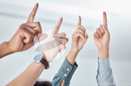 Image of Business people, hands or pointing up for ideas, success or innovation vision in creative office team building. Zoom, finger or company vote for opinion, gesture or teamwork collaboration for workers