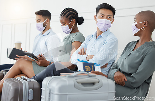 Image of Covid, airport and group of people waiting together before traveling, compliance during pandemic. Safety, health and corona rules with diverse crowd talking in an airport lounge, relaxed and sitting