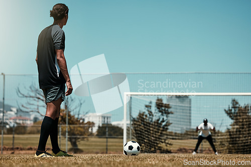 Image of Training, goal and soccer player with goalkeeper at sports field for target, score and practice. Fitness, exercise and sport game with football athlete thinking of game strategy before ball kick