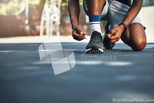 Image of Sport, fitness and shoes of runner before exercise and morning cardio in city, lace tie, feet and closeup. Health, wellness and sneakers of man before running outdoor for training, health and workout