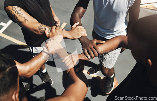 Image of Wrist hands, sports teamwork and support, collaboration and cooperation for basketball court game. Above athlete group solidarity, partnership and motivation of goals, trust and friends commitment