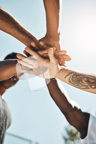 Image of Support, teamwork and hands of friends on basketball court for fitness, health and community sports workout. Training, coaching and team building with athletes for goals, exercise and competition