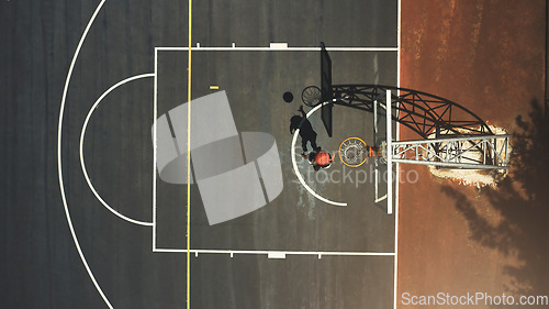 Image of Top view, basketball court or man scoring goals in fitness workout, training or exercise for health, wellness or heart cardio. Sports, energy or basketball player in winner game, math or competition