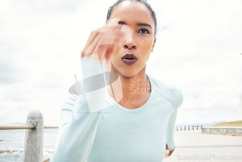 Image of Speed, focus and running black woman with outdoor motivation for competition training, goal or wellness lifestyle with sky mock up. Commitment of fast race or sports athlete workout exercise by ocean