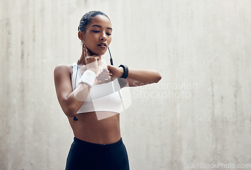 Image of Smartwatch, fitness and thinking black woman check time running results or training workout progress on wall mock up marketing. Sports athlete with smart watch for exercise goal or idea mock up