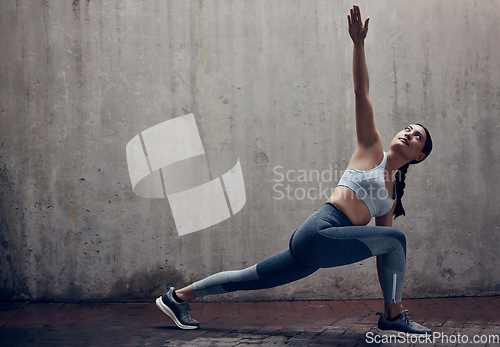 Image of Yoga fitness training, woman and healthy outdoor stretch workout on city sidewalk. Sports runner warm up, motivation and deep thinking, concentration and healthy athletic exercise lifestyle outdoors