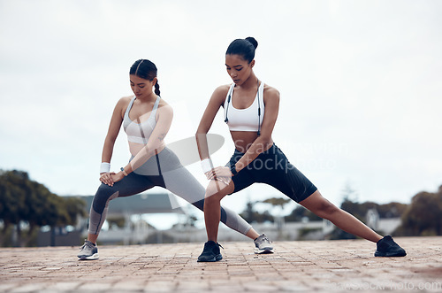 Image of Fitness, city workout and women stretching together before marathon running. Health, wellness and sports, motivation to exercise with dynamic or static flexibility and balance performance training.