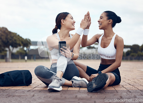 Image of High five, success and fitness friends with goals, motivation and winning mindset in celebration of targets. Sports, teamwork and happy women celebrate running workout, exercise and cardio progress