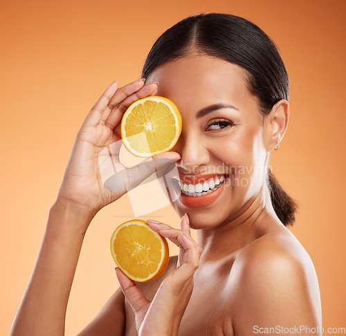 Image of Skincare, makeup and beauty girl with orange product for diy facial treatment, cosmetics or self care. Natural detox, fruit and happy black woman face with smile, glowing skin and body care nutrition