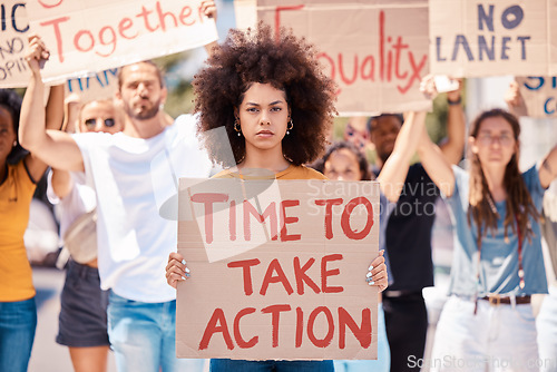 Image of Protest, poster and black woman, crowd or equality, human rights or racism protesters in city. Activism, action time or angry group demand freedom, end to racial discrimination or government change.