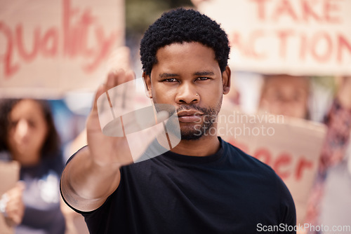 Image of Protest, hand and stop with a black man in a demonstration or rally for human rights and equality. Justice, freedom and politics with a male activist ready to fight racism, violence or discrimination
