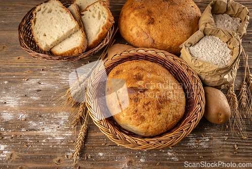 Image of Sliced and whole sourdough bread