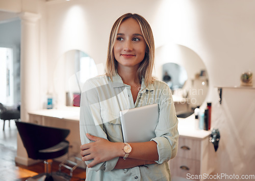 Image of Hairdresser salon, happy and woman with tablet to check digital schedule, calendar or work day planner. Hair care, beauty studio and barbershop worker with mobile tech checklist to track inventory