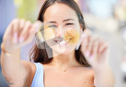 Image of Sunglasses, portrait and woman with smile in the city of Miami during a holiday for travel in summer. Face of a happy, trendy and Asian girl with glasses, lens and frame for fashion on vacation