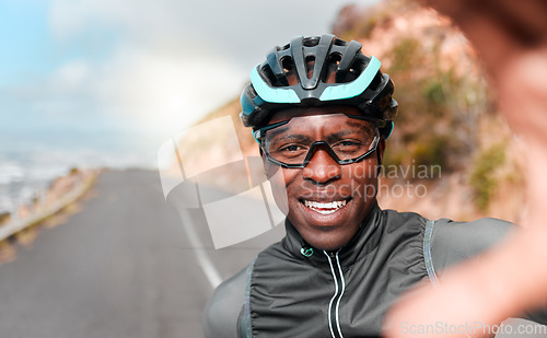 Image of Cycling, portrait and selfie with man in a road along a mountain in South Africa, happy, relax and excited. Fitness, training and face of cyclist photo break during morning cardio exercise in nature