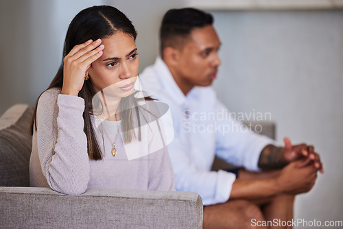 Image of Divorce, sad and fight with couple on sofa with marriage problems feeling frustrated, conflict or angry. Thinking, therapy or counseling with man and woman in living room for fail, decision or fear