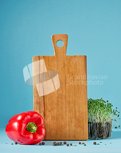 Image of still life with wooden cutting board