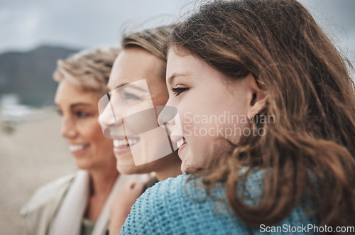 Image of Face, girl, mother and grandma at a beach, relax, travel and family vacation in Florida with multigenerational women. Happy family, smile and holiday with ladies embracing and enjoy Mexico ocean view