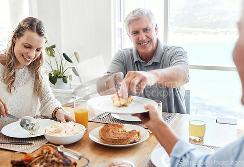 Image of Family, food and lunch with a senior man sharing a meal with his daughter in the dining room of their home during a visit. Retirement, love and eating with an elderly male pensioner and relatives