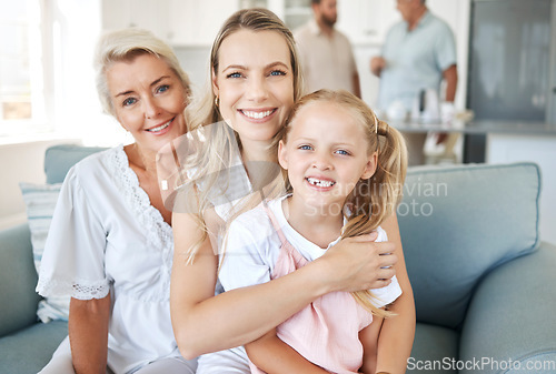 Image of Family, love and generations with a girl, mother and grandmother sitting on a living room sofa in the home together. Kids, visit and children with a woman, parent and daughter in a house for a visit