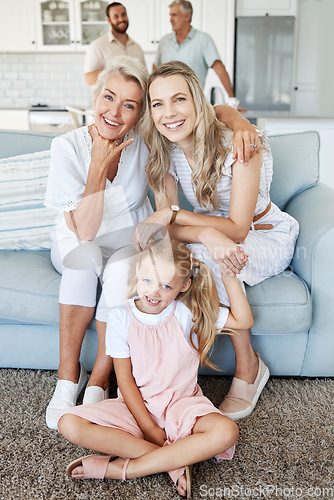 Image of Mother, daughter and child with smile for photo in the living room of their house together. Portrait of a happy, relax and calm child with her grandmother and mom during a visit in the lounge
