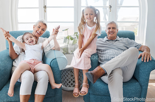Image of Happy grandparents, children and smile in relax for family bonding time together in the living room at home. Portrait of grandma, grandpa and little girls smiling in playful happiness for free time
