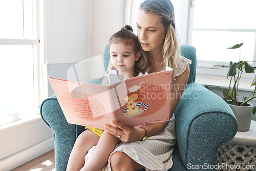 Image of Mother, girl and book on sofa for story, reading and education in home, living room and together. Mom, child and story book for learning, teaching and childhood development for smart mind in house