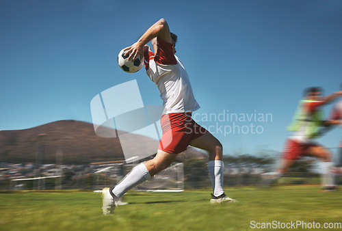 Image of Training, man and soccer ball throw on soccer field during game or competition outdoor. Sports, fitness and football player pitching ball during practice, exercise or workout session on grass field